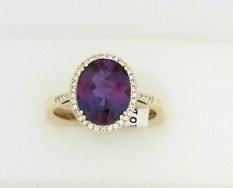 Ladies 14 Karat Yellow Gold Fashion Ring With 3.50Tw Oval Alexandrite And 0.12Tw Round G/H Si2 Diamonds Size 7